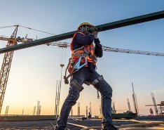 Image of worker on jobsite/Adobe stock